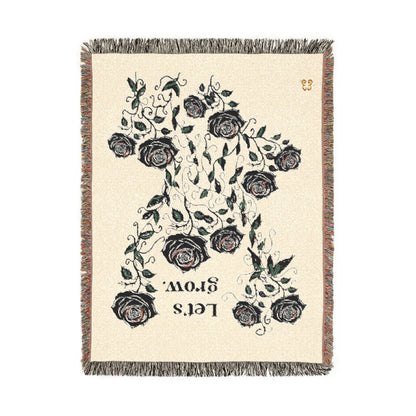Vintage floral area rug, beige cotton blend with fringe border and black rose print