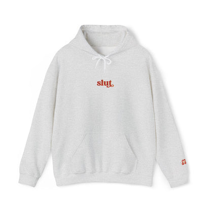 Light gray hoodie sweatshirt with white drawstring and red “slut” graphic, soft cotton blend