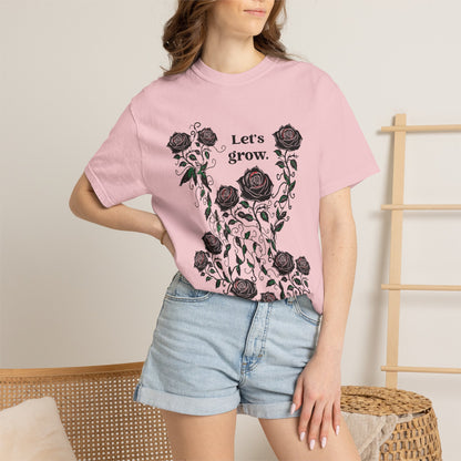 Pink t-shirt with floral rose graphic and “Let’s grow” slogan, soft cotton jersey