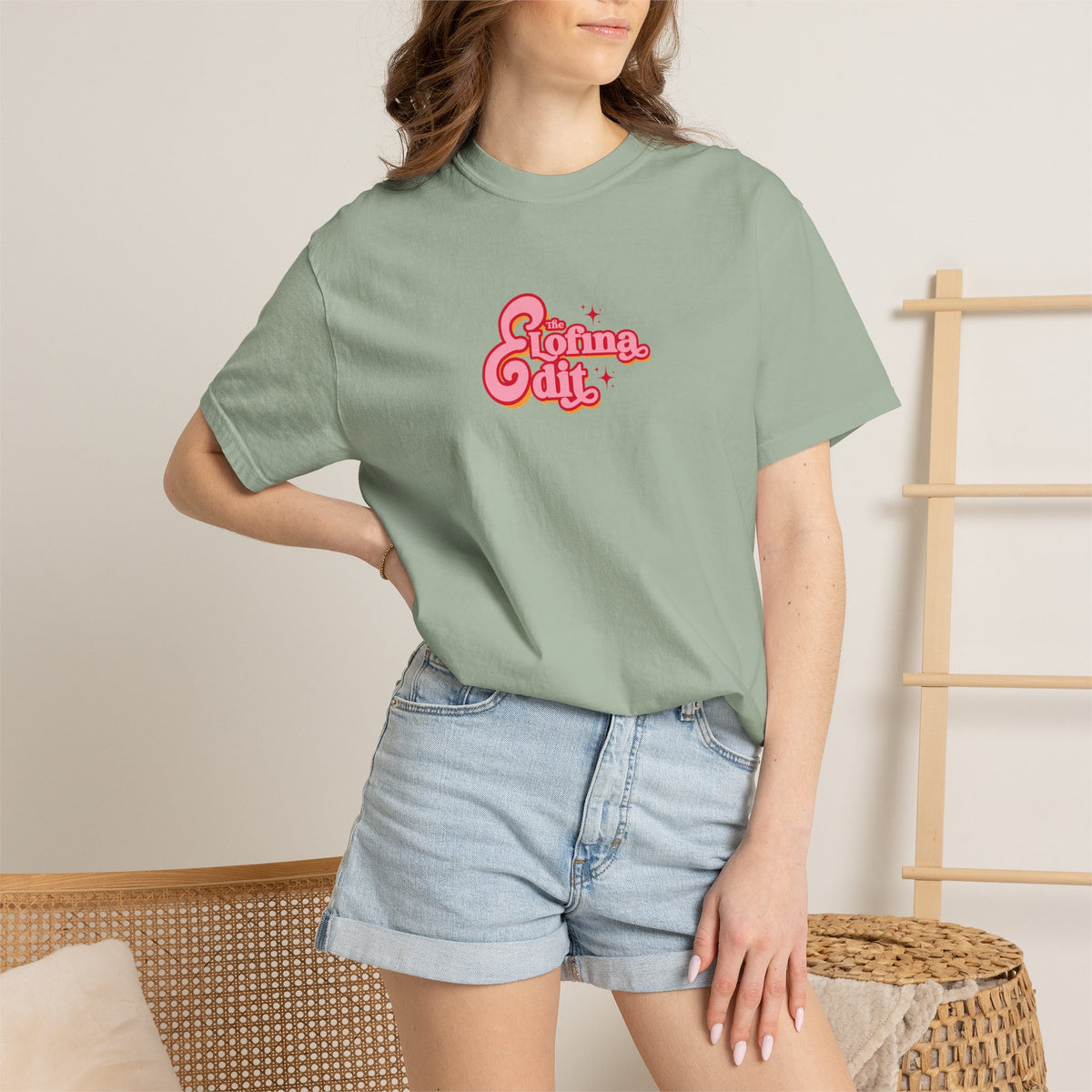 Mint green T-shirt with The Lofina Fit logo graphic; soft cotton-blend tee
