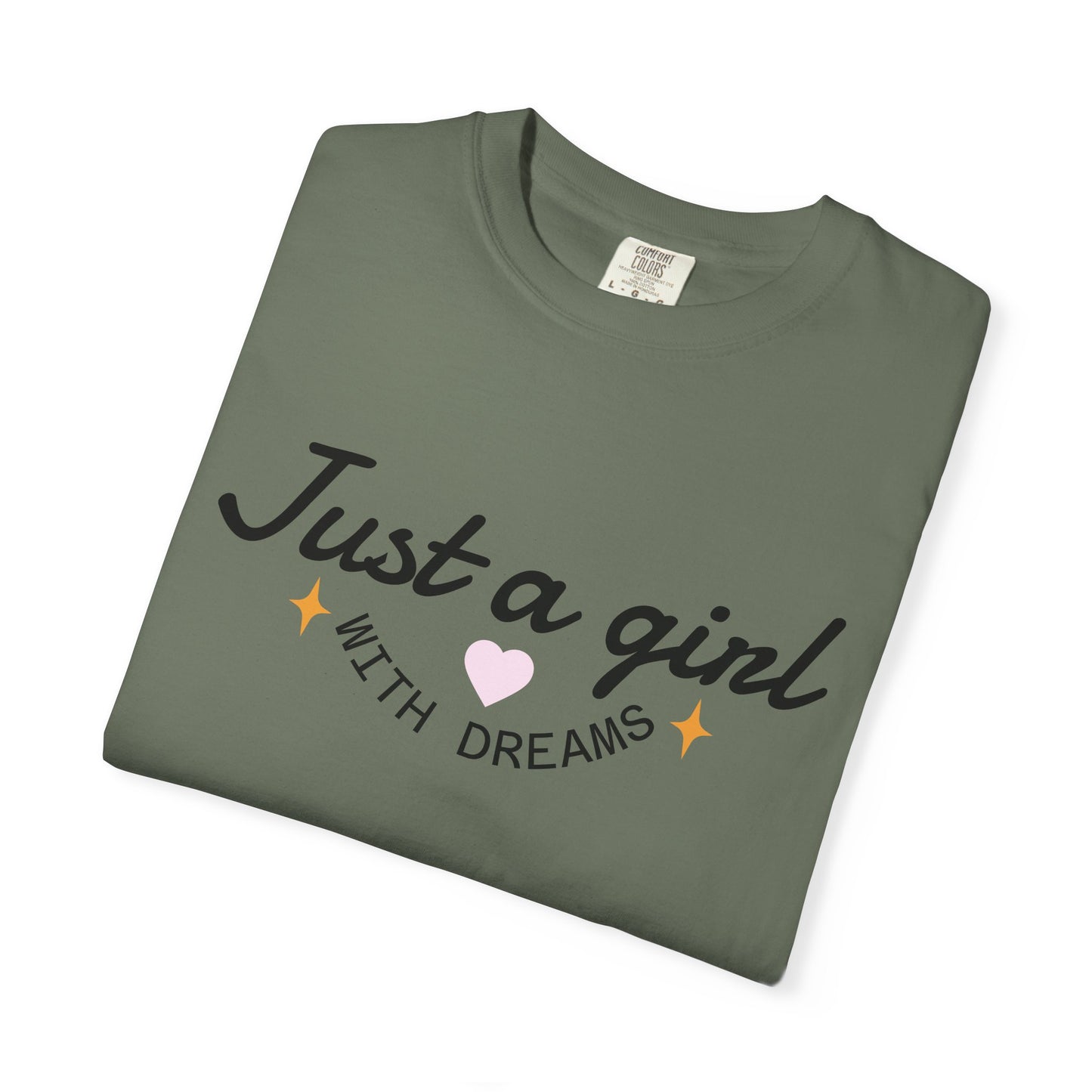 Olive green t-shirt with the text 'Just a girl WITH DREAMS' and a small pink heart.