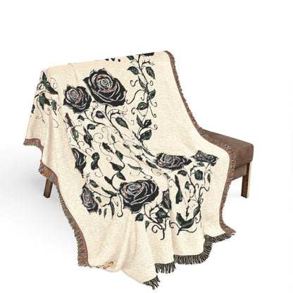 Floral throw blanket, cream knit with black rose pattern and colorful fringe trim
