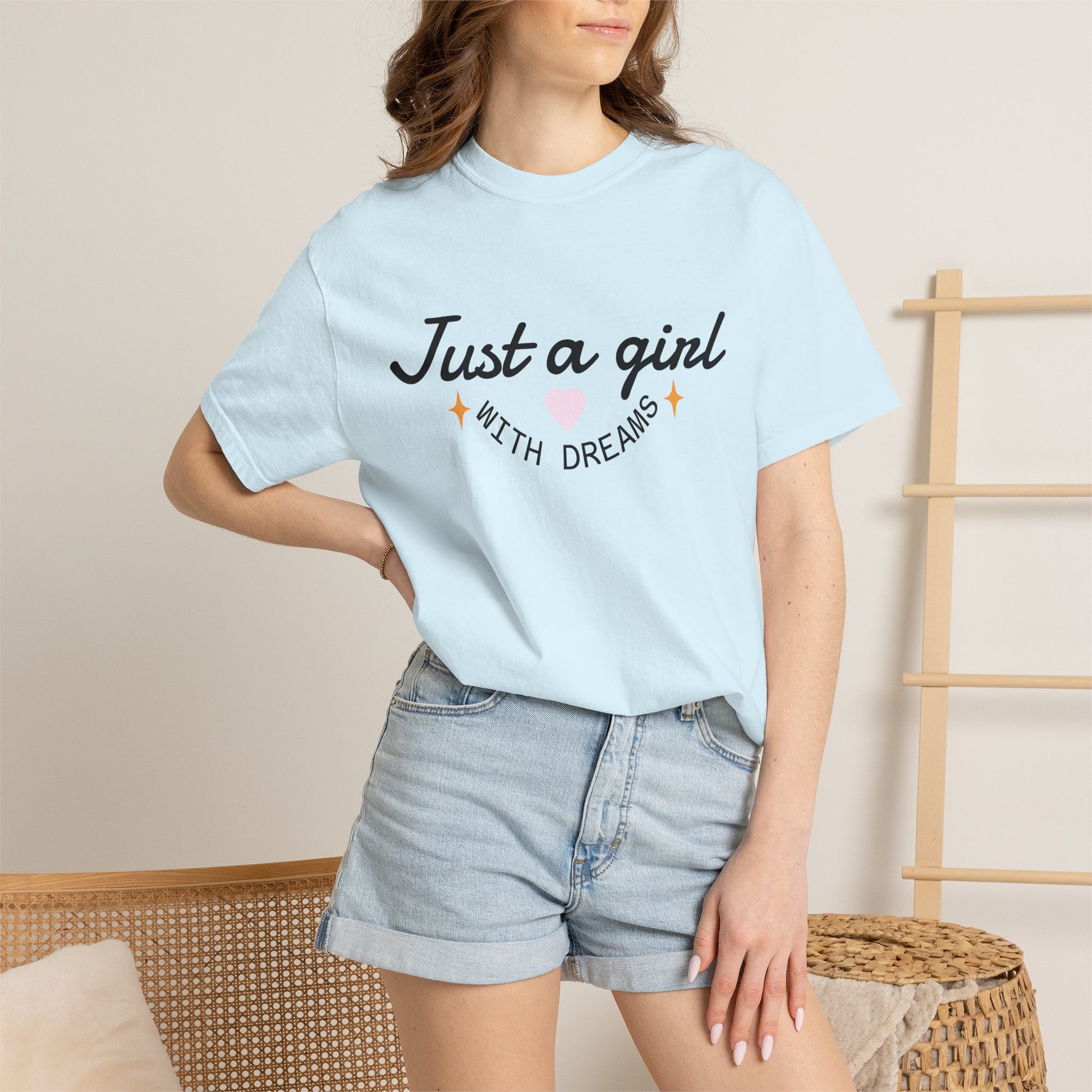 Light blue graphic T-shirt with “Just a girl with dreams” slogan, soft cotton