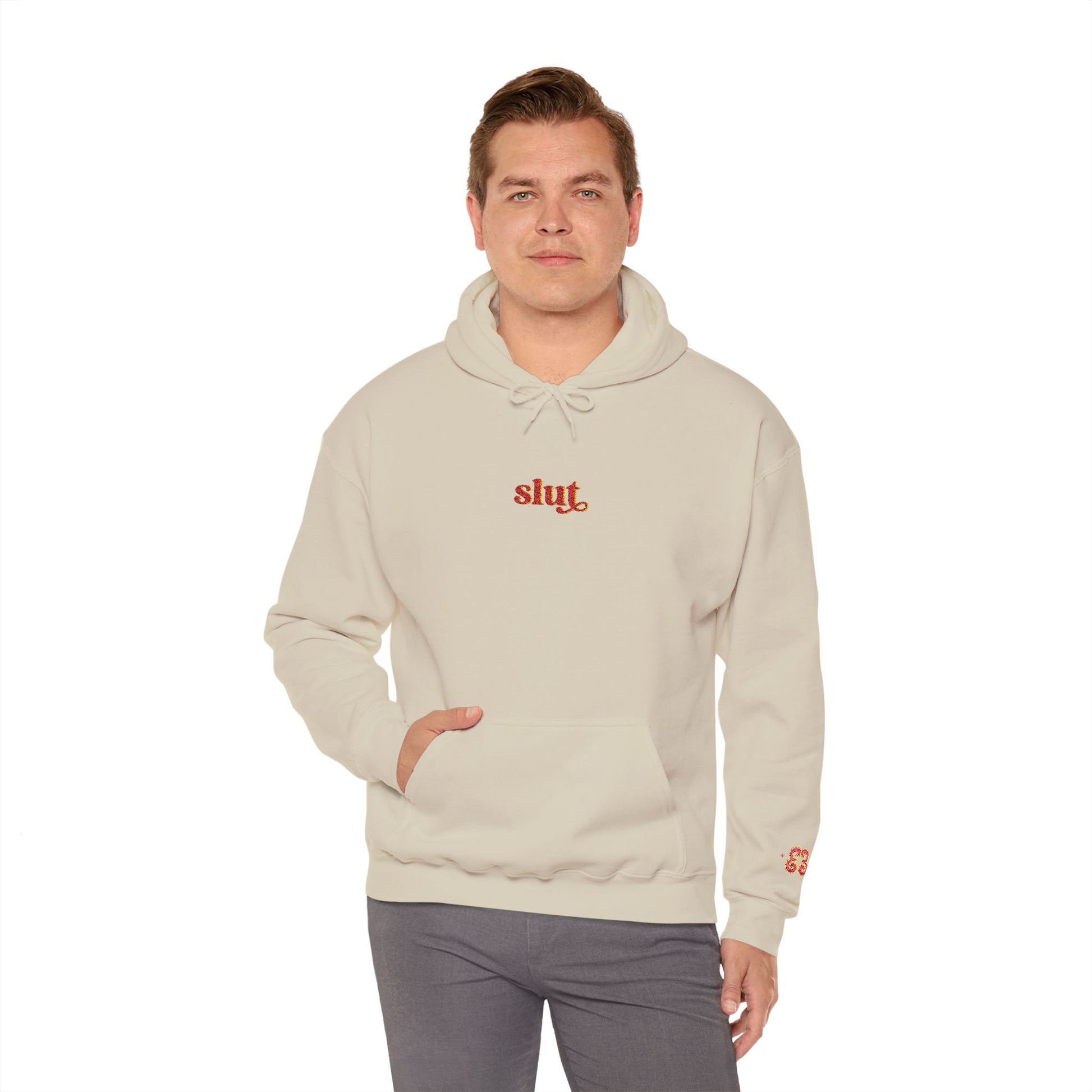 Beige hoodie sweatshirt with red “slut” logo, drawstring hood, soft cotton blend