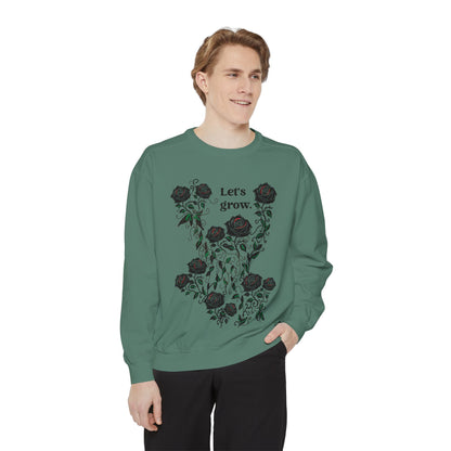 Green men’s sweatshirt with rose graphic and “Let’s grow” slogan, cotton-blend long sleeves