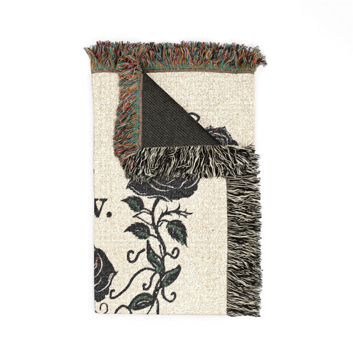 Printed scarf blanket with multicolor fringe trim, beige fabric and black graphic patchwork