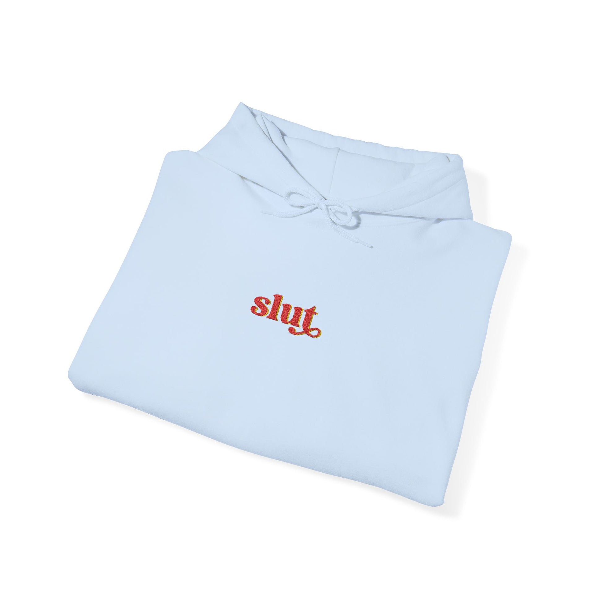 Light blue hoodie, “Slut” chest logo, drawstring hood, laid flat